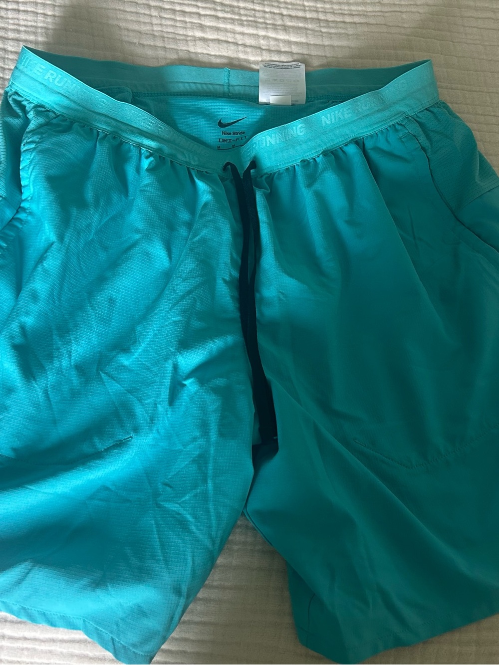 Medium Nike Stride Dri-fit teal Running Shorts